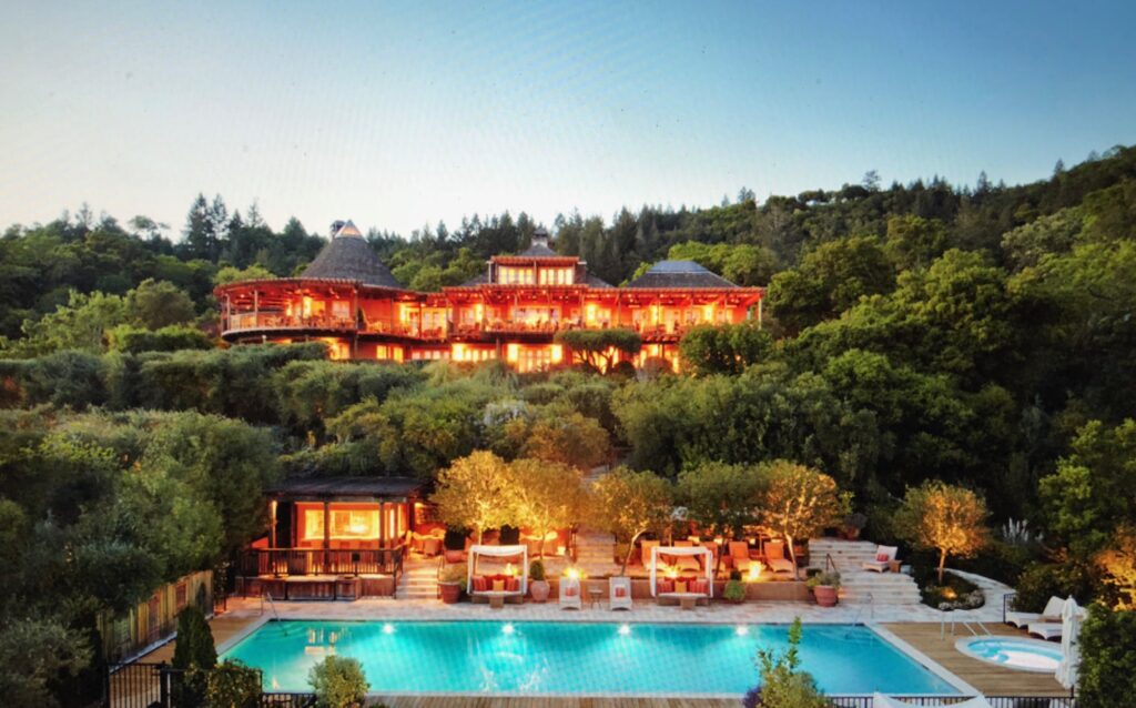 A large pool with many chairs around it