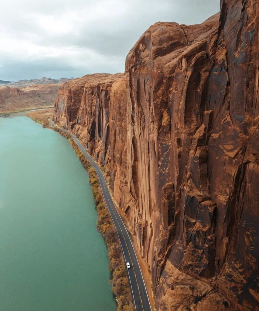 A road going down the side of a mountain.